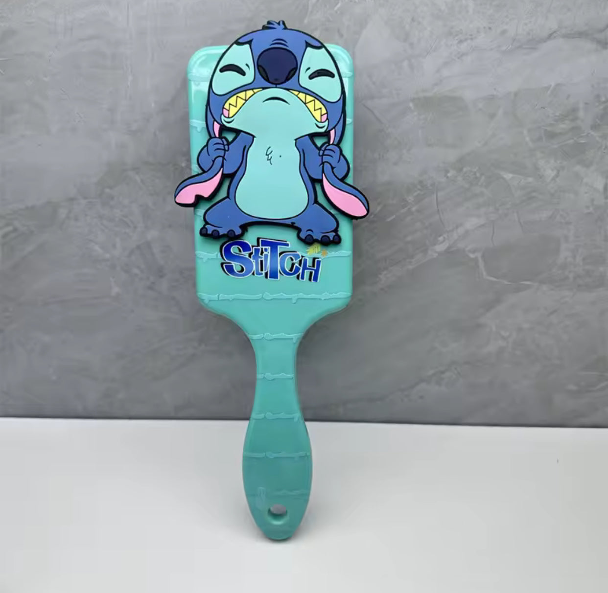 Stitch massage comb for children